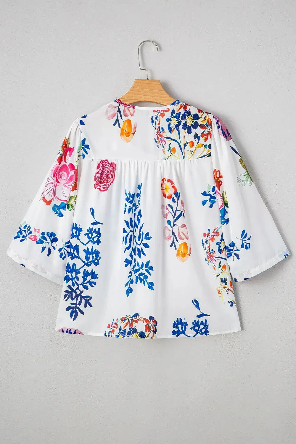 Bloom Printed 3/4 Sleeve Tie Neck Tassel Boho Blouse